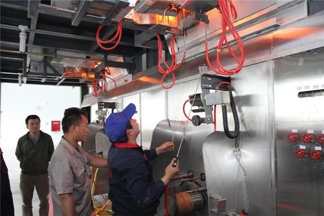 达州新型材料：玄武岩沥青短切纱投入经开区经开大道沥青路面铺设