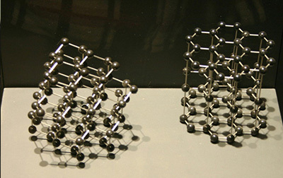 Graphite atoms are transformed and attached to the seed crystal, which gradually grows into large diamonds
