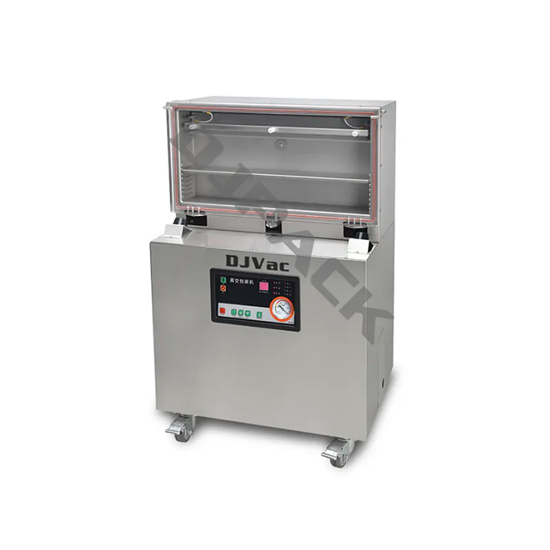 VERTICAL TYPE VACUUM PACKAGING MACHINE