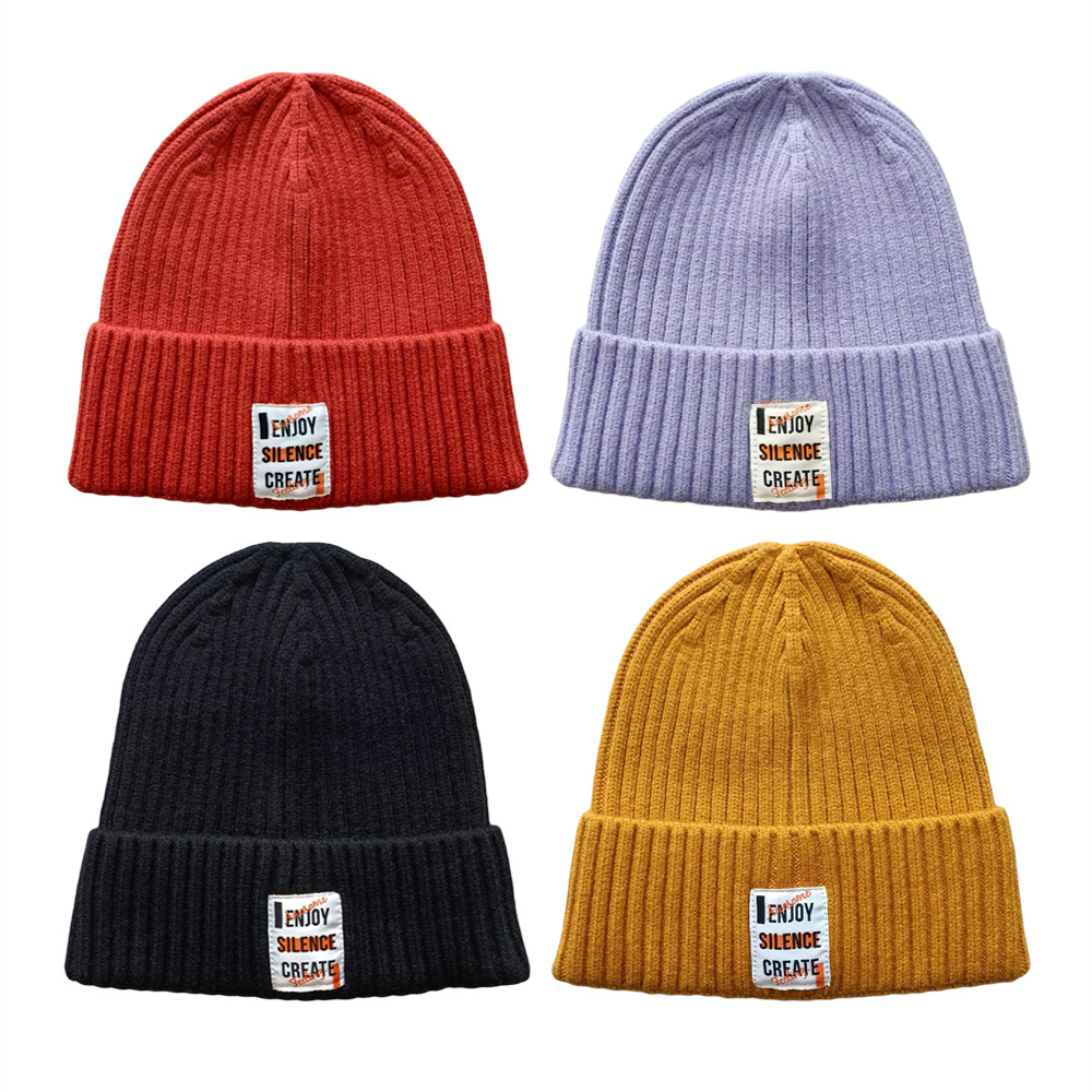 100% acrylic beanie hat suppliers soft hand feeling with woven label patch