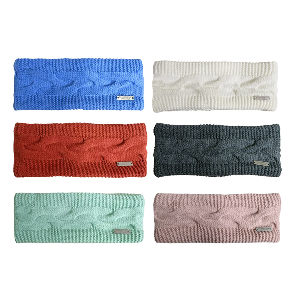 100% acrylic knitted headband with fake fur lining and metal patch logo