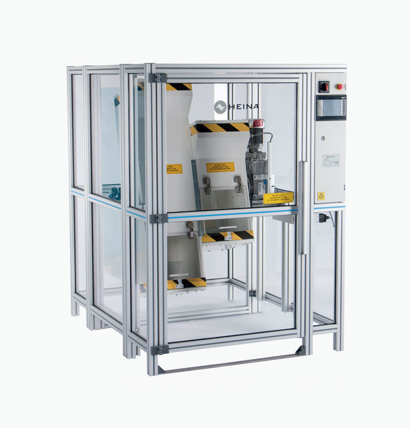 Tumbling barrel drop tester