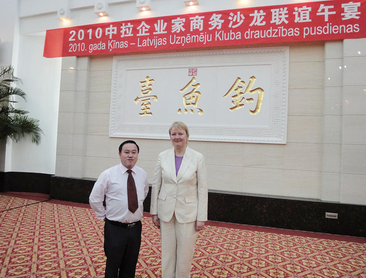 Group photo of the Chairman and Ms. Leyin, Latvia's Ambassador to China
