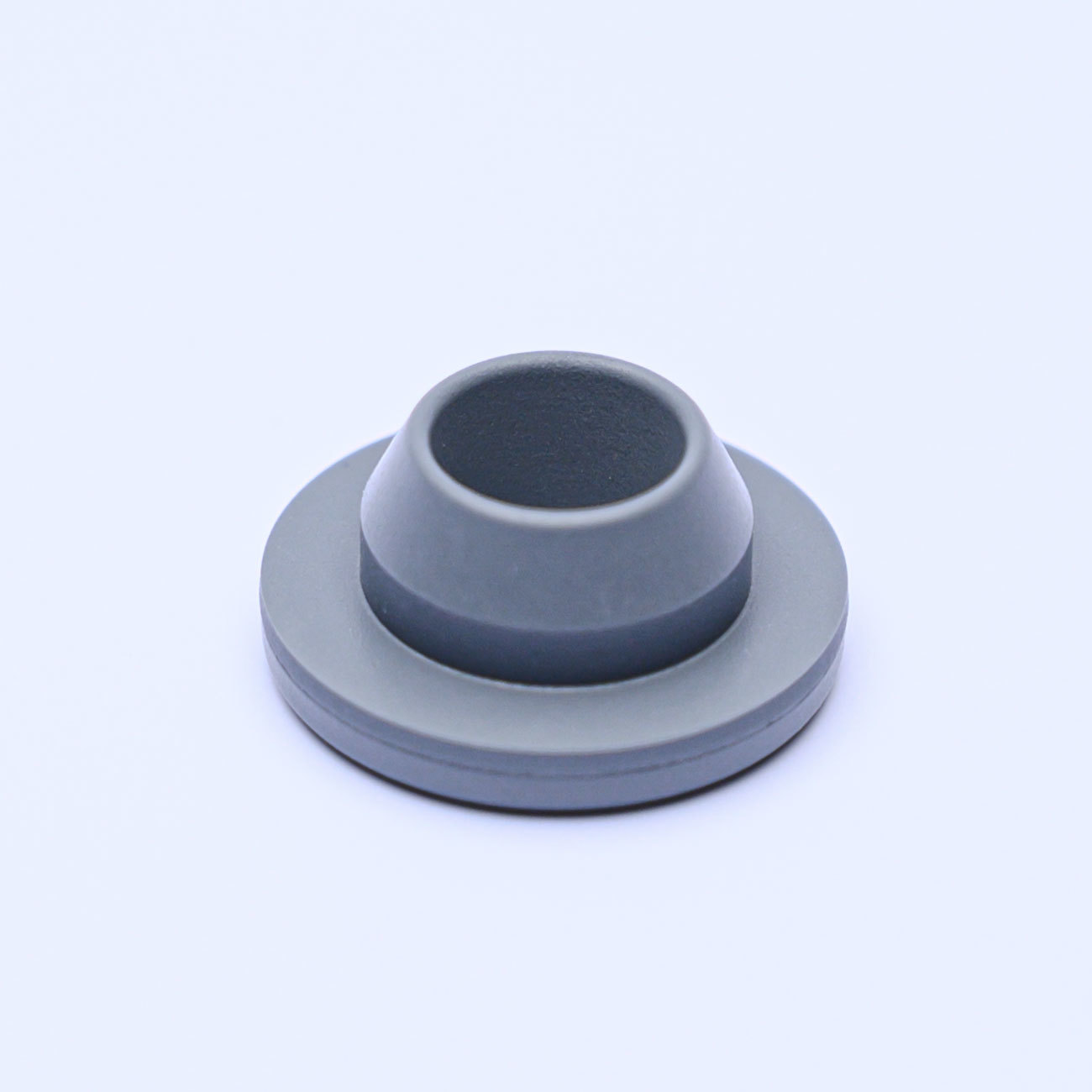 Halogenated butyl rubber stopper for sterile powder for injection