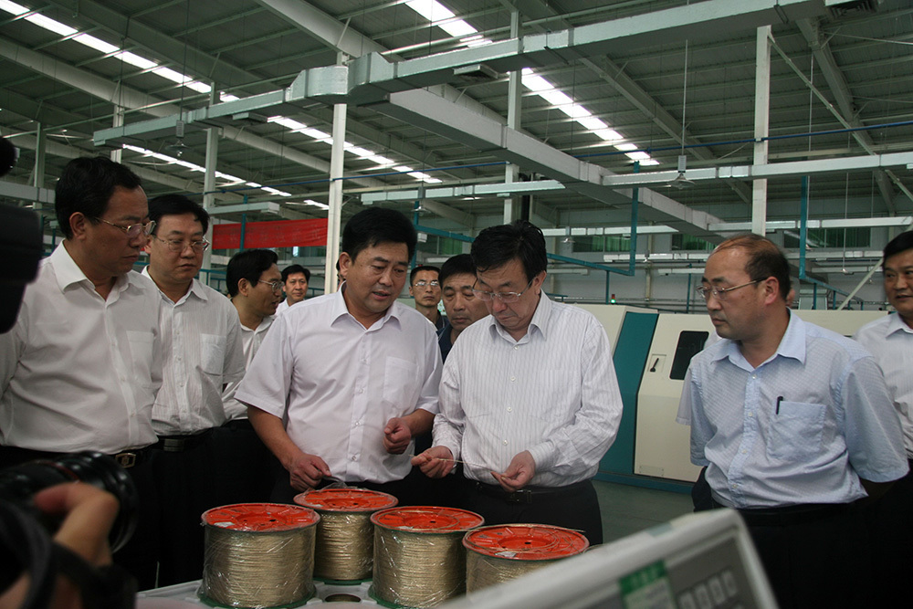 Guo Gengmao, then secretary of the Henan Provincial Party Committee, conducted research in our company.