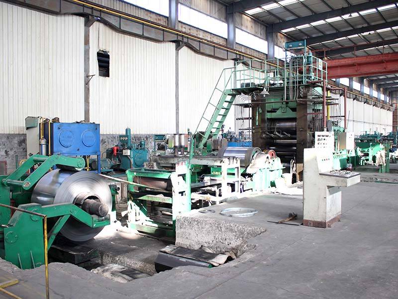 Leveling and shearing machine