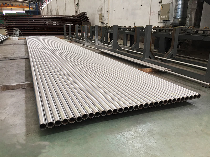 Composite Tube with Cladding