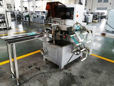 SC-250 AUTOMATIC FLAT CHOCOLATE FOIL PACKER