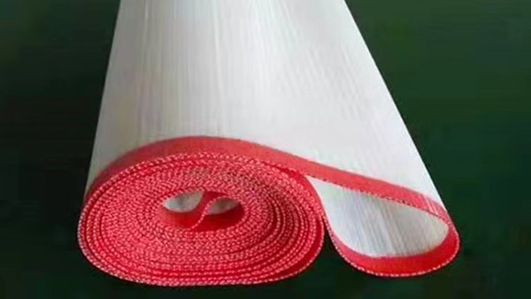 What are the restrictions on the size of the polyester mesh belt?