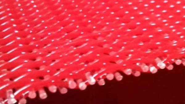 What are the material characteristics and abrasion resistance of polyester mesh belt?