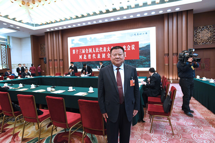 Zhan Guohai, a representative of the National People's Congress and chairman of Hebei Xinhai Holding Co., Ltd., returned to his hometown! What news did he bring from Beijing?