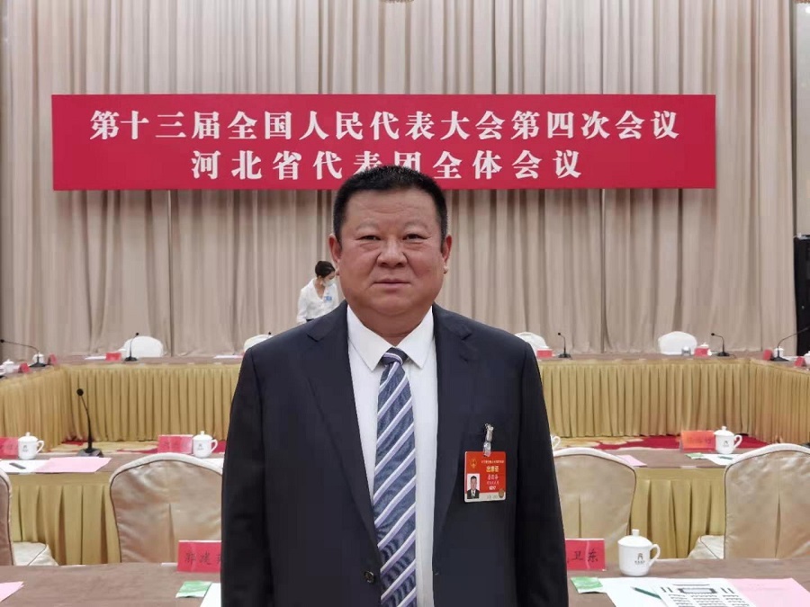 Zhan Guohai, chairman of Xinhai holding group, went to Beijing to attend the fourth session of the 13th National People's Congress
