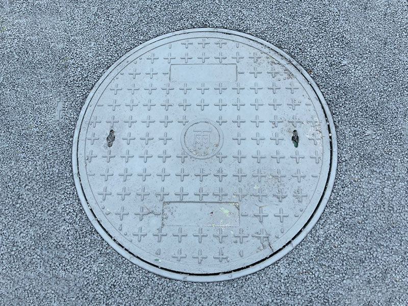 What are the materials of the composite manhole cover?