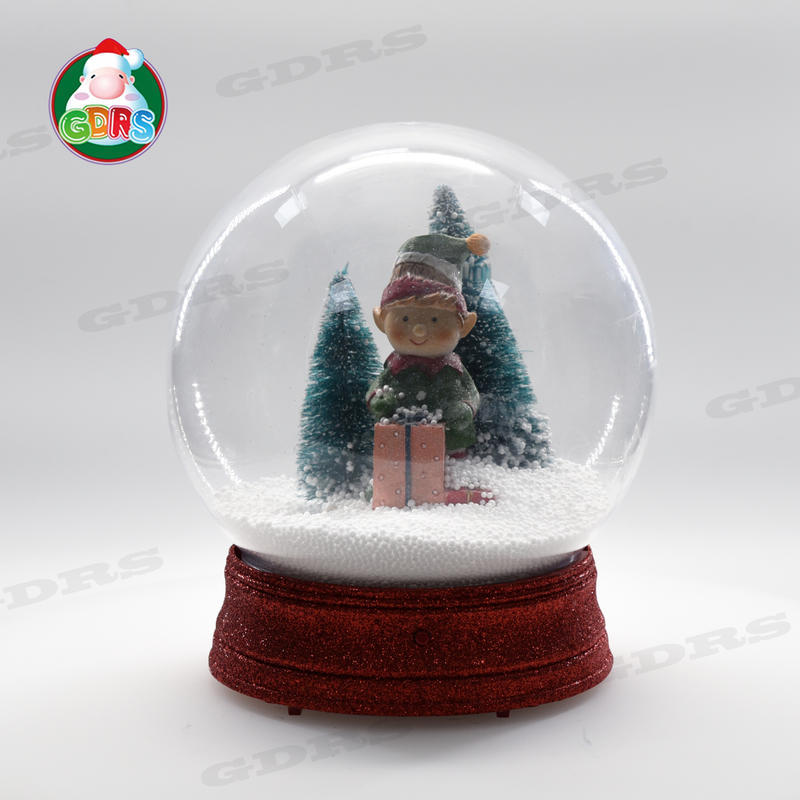 10In Christmas musical snowing globe
