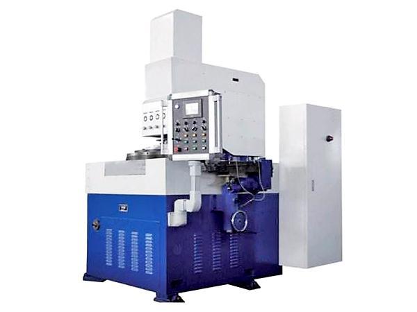 Double-sided grinding machine