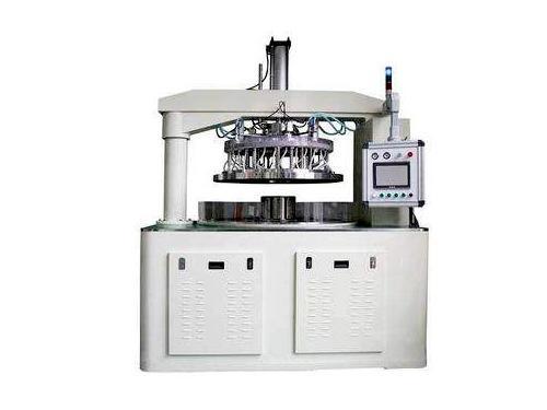 Double-sided grinding machine