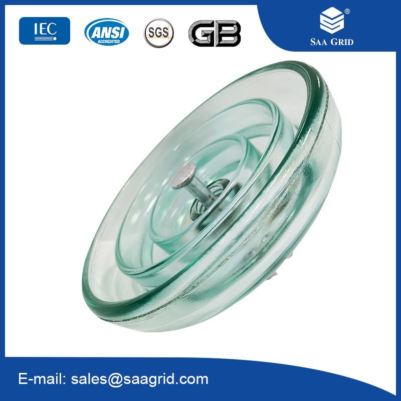 Antifouling glass insulators for AC systems