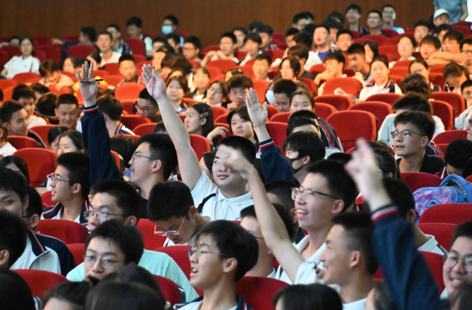 Students raised their hands enthusiastically