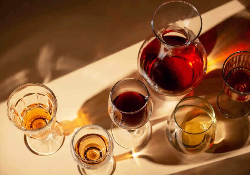 Clearing of alcoholic beverage and fruit juice