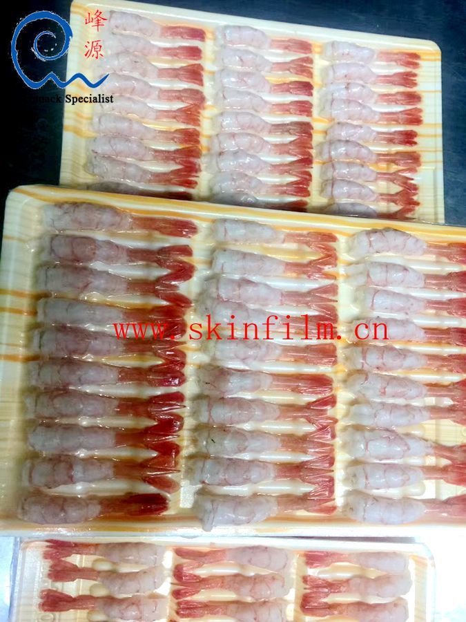 Frozen seafood skin packaging machine (frozen aquatic skin packaging machine) frozen shrimp skin packaging example: