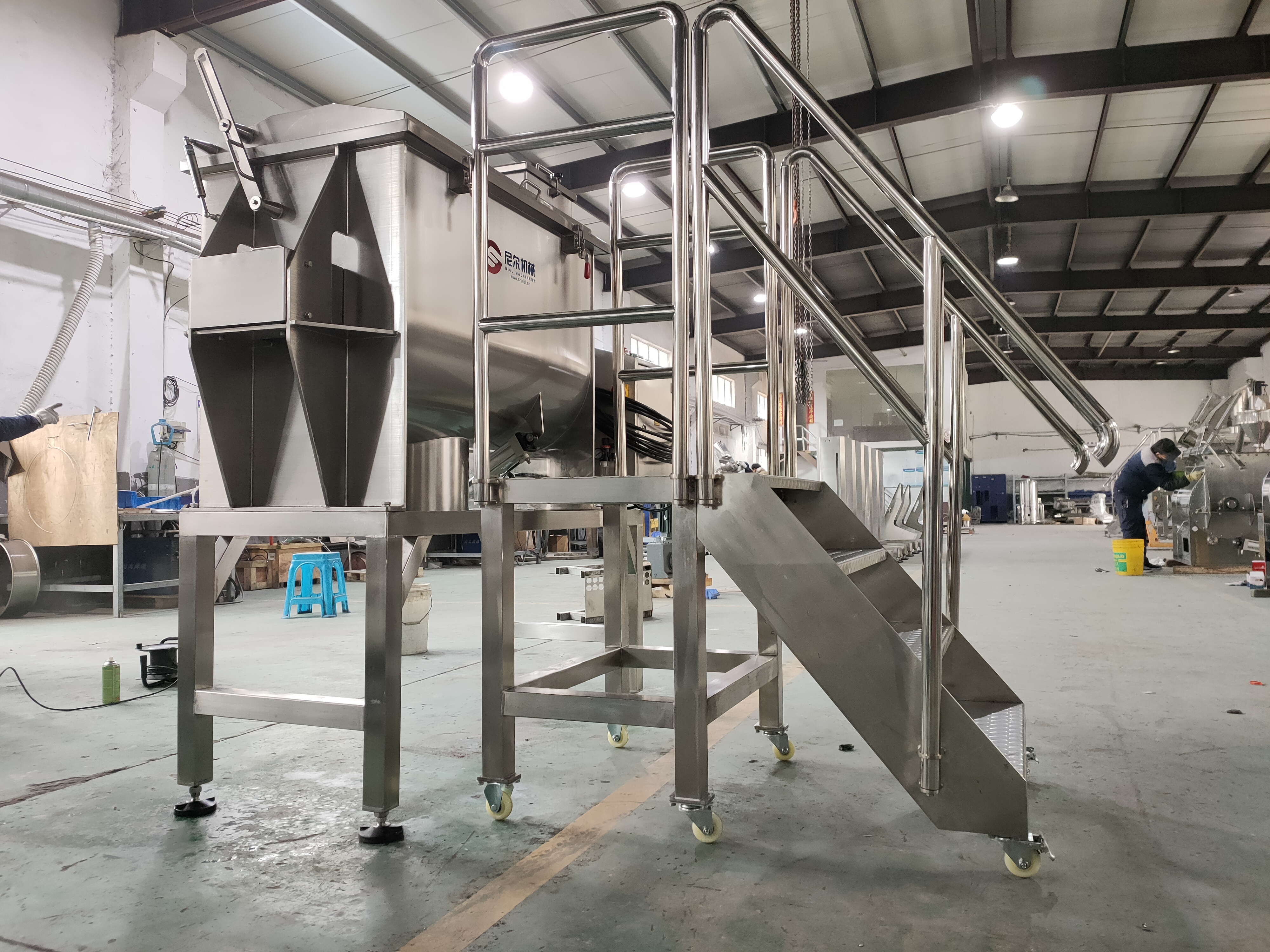 How does the cost performance of the ribbon mixer compare?