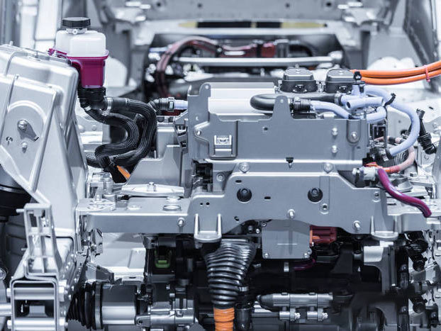 Briefly describe the working principle of automotive engines