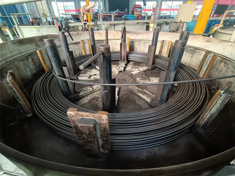 What is the purpose of tempering the spring