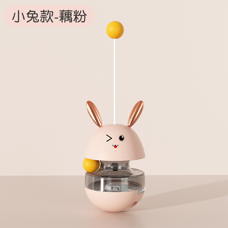 新款貓貓創(chuàng)意玩具兔子牛角漏食不倒翁