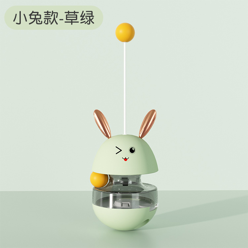 新款貓貓創(chuàng)意玩具兔子牛角漏食不倒翁