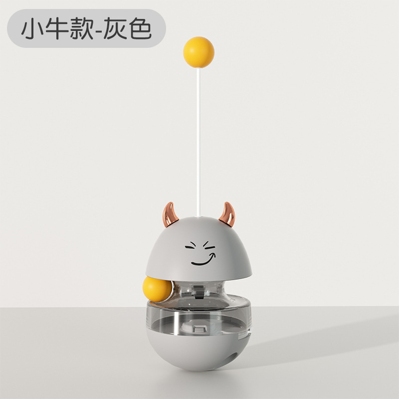 新款貓貓創(chuàng)意玩具兔子牛角漏食不倒翁