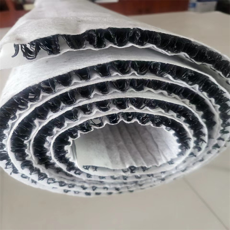 Composite W-shaped drainage pad