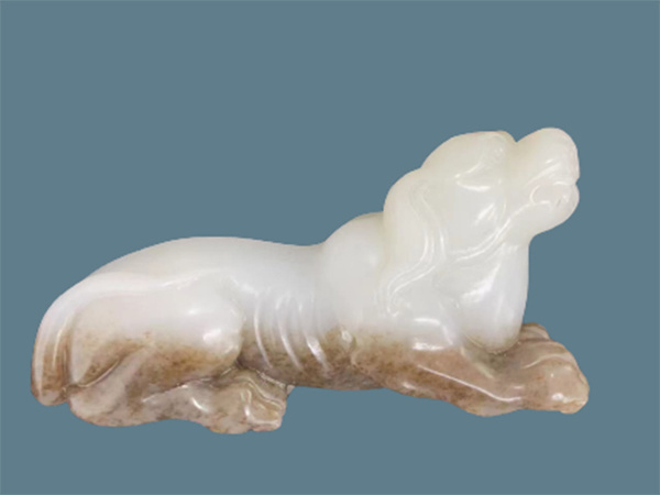 和田羊脂白玉帶糖瑞獸手把件