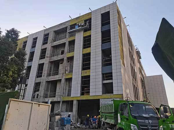 Nanjing Qinglu Shangju White Linen Sandblasting Surface Integrated Board Construction Site