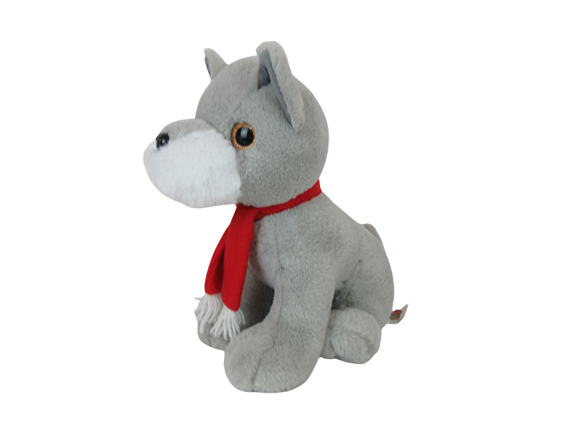 A Gray Plush Dog Toy Wearing a Scarf