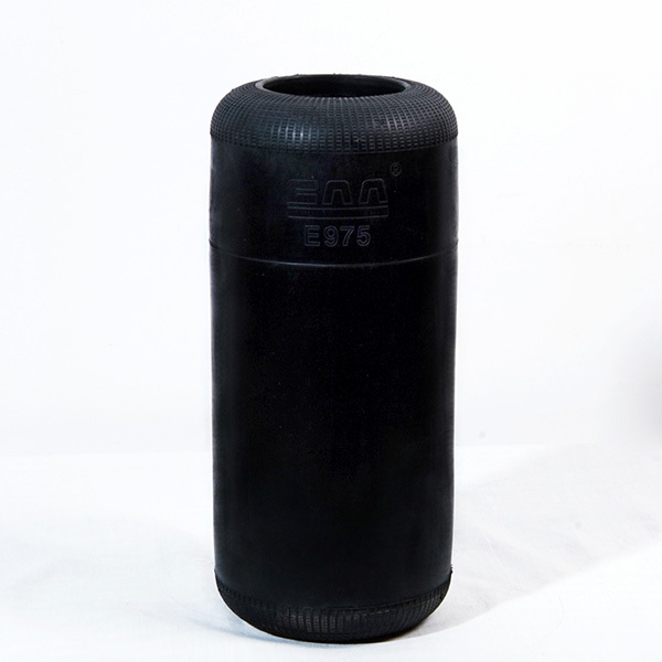 E975