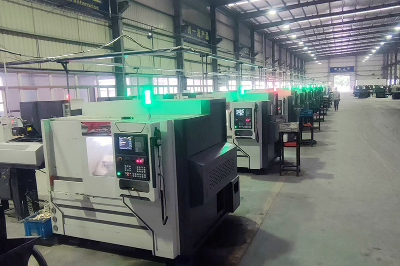 Double-spindle butt CNC machine tool TS-30 with automatic loading and unloading mechanism serves the intelligent manufacturing and production site of XXX copper pipe joint fittings Double-spindle butt CNC machine tool TS-30 with automatic loading and unloading mechanism serves the intelligent manufacturing and production site of XXX copper pipe joint fittings