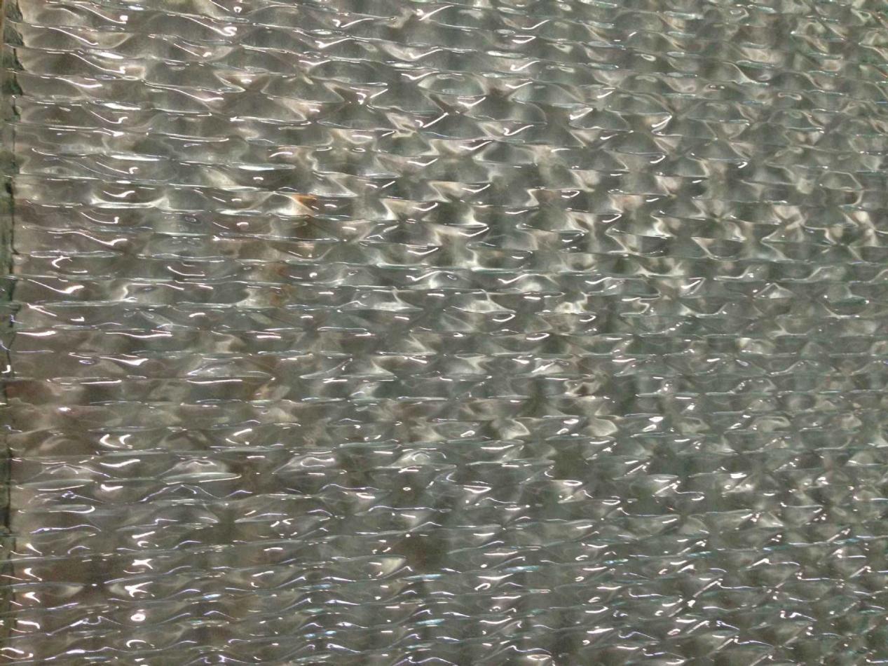 Is hot-melt glass artistic? Don't ignore its practicality. Shenzhen hot-melt glass deep processing factory