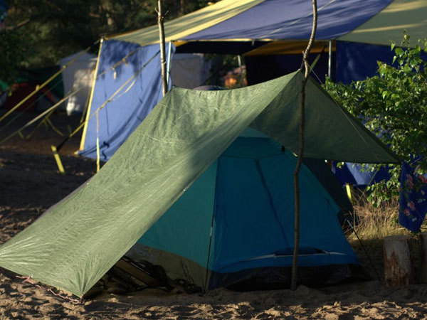 What are coated tarps used for?