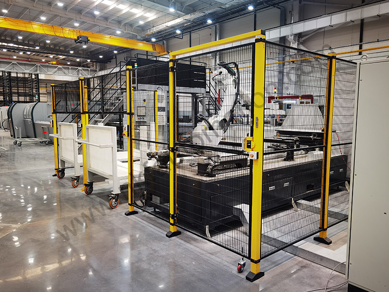 Safety fence supporting ABB robot handling application