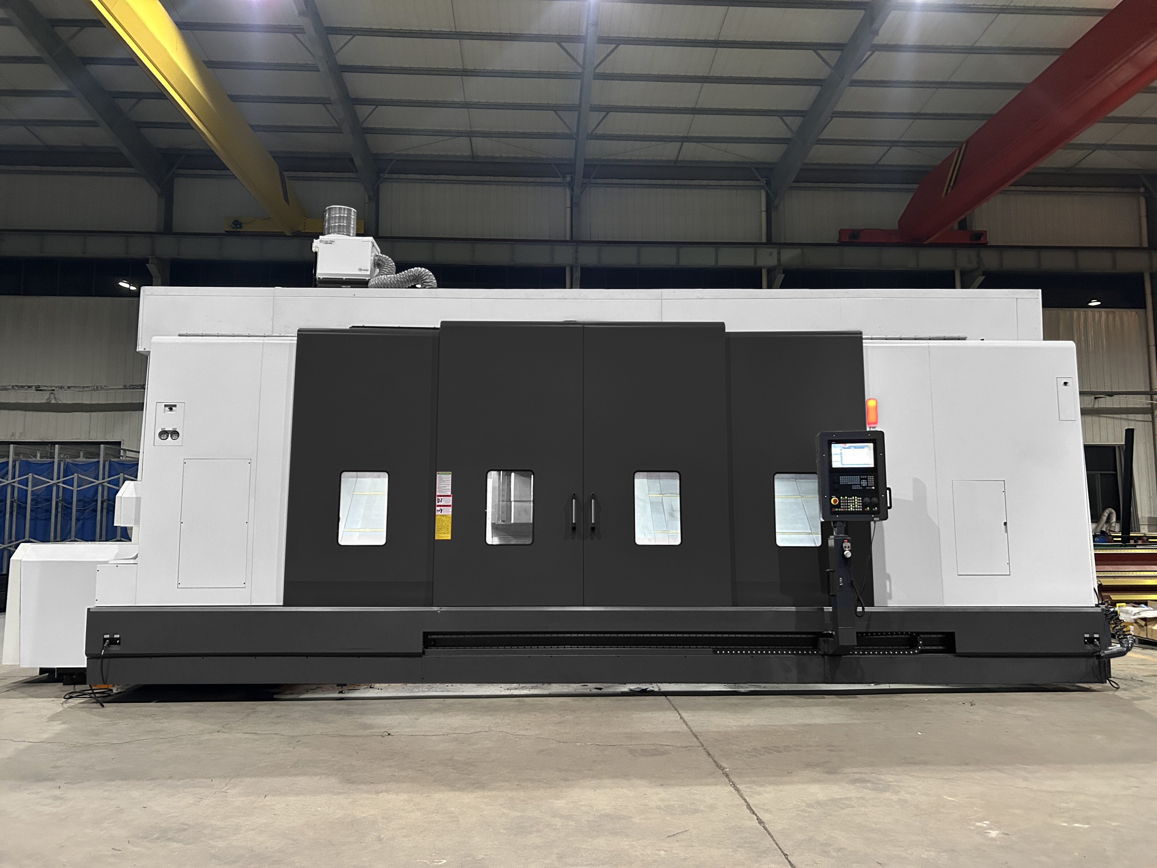 What are the key elements of a horizontal medium to large turning centre to improve efficiency and machining accuracy?
