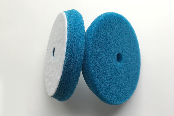 Middle hole beveled sponge ball