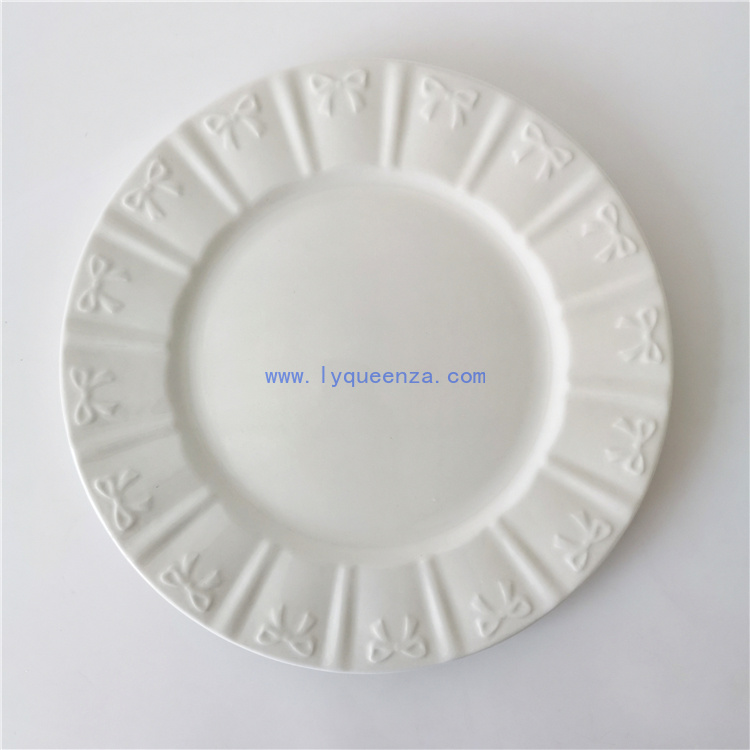 wholesale  10.5inch Pure White Fine Porcelain Dinner Plate with Embossed Bow Pattern