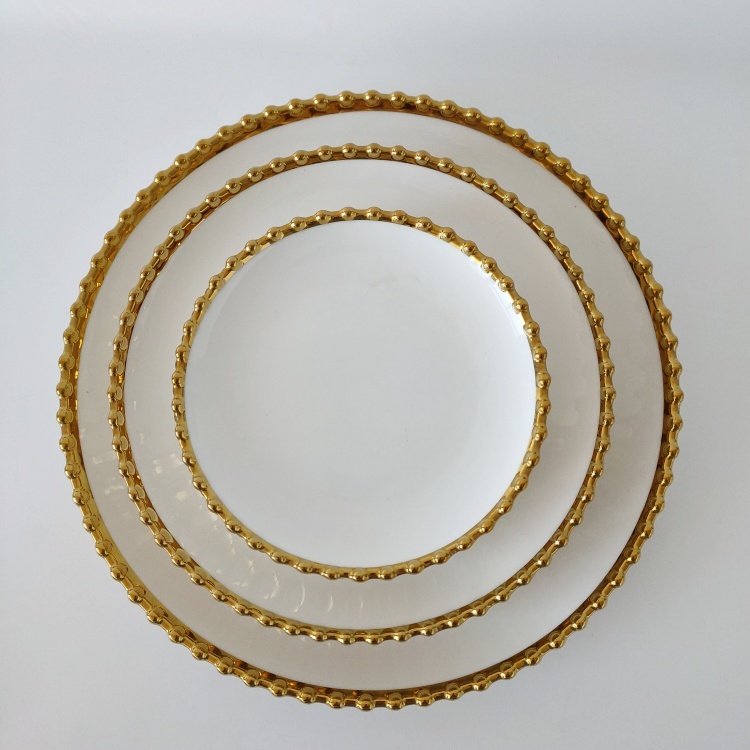 Electroplated ceramic plate with gold edge, beaded border plate