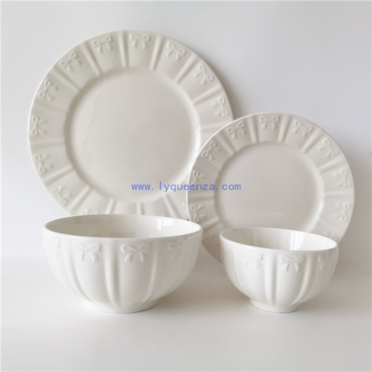 Elevate Every Meal with 16 - Piece Bow - Embossed Porcelain Dinnerware