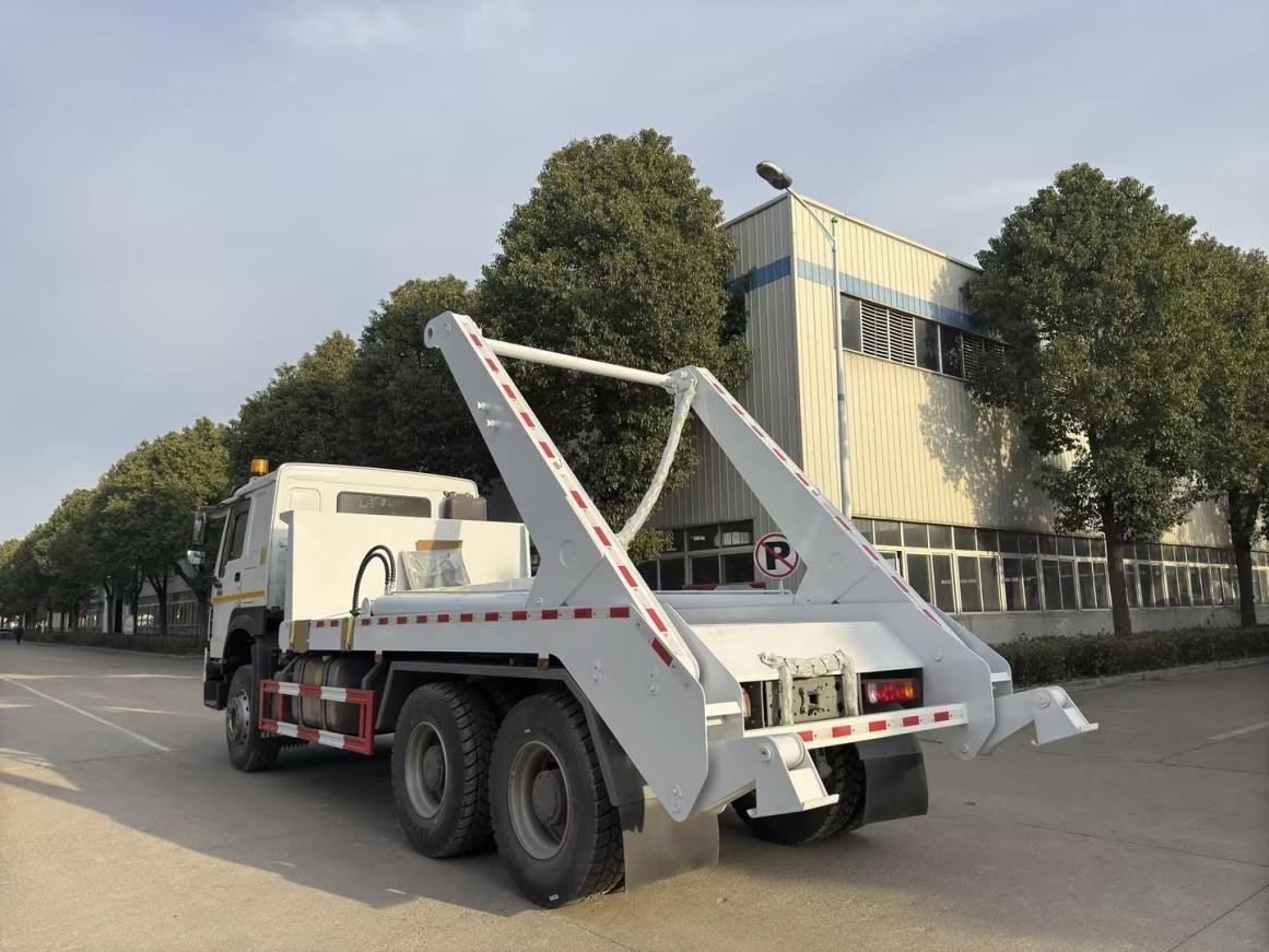 HOWO 6×4 Swing Arm Garbage Truck 14CBM with Hanging Chain and Hydraulic Lifting Waste Removal Truck HOWO 6×4 Swing Arm Garbage Truck 14CBM with Hanging Chain and Hydraulic Lifting Waste Removal Truck