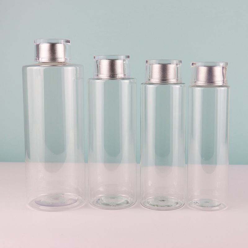 Flat shoulder bottle with acrylic lid