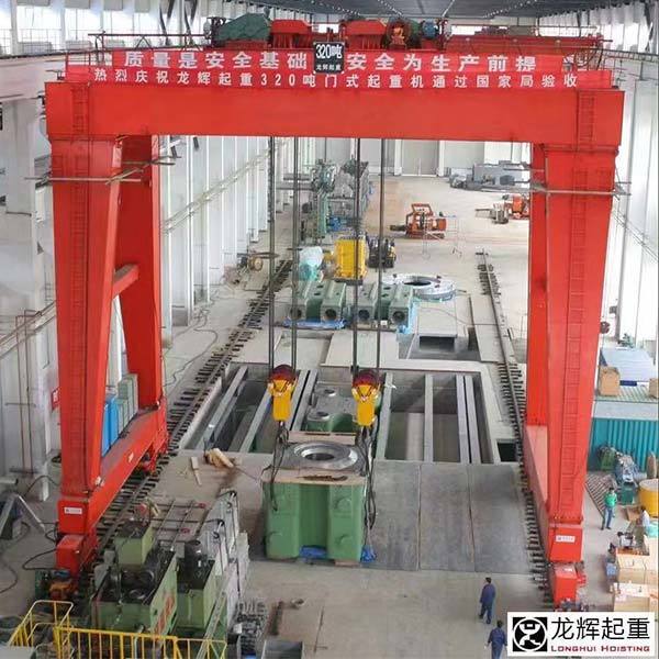 碼頭集裝箱門式起重機的控制系統采用哪種類型（如 PLC 控制等）？
