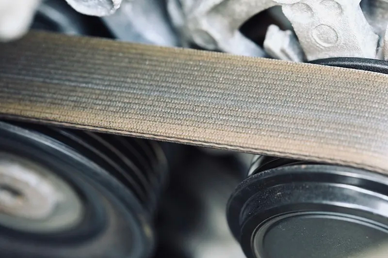 What are the consequences of not replacing the engine belt for a long time?