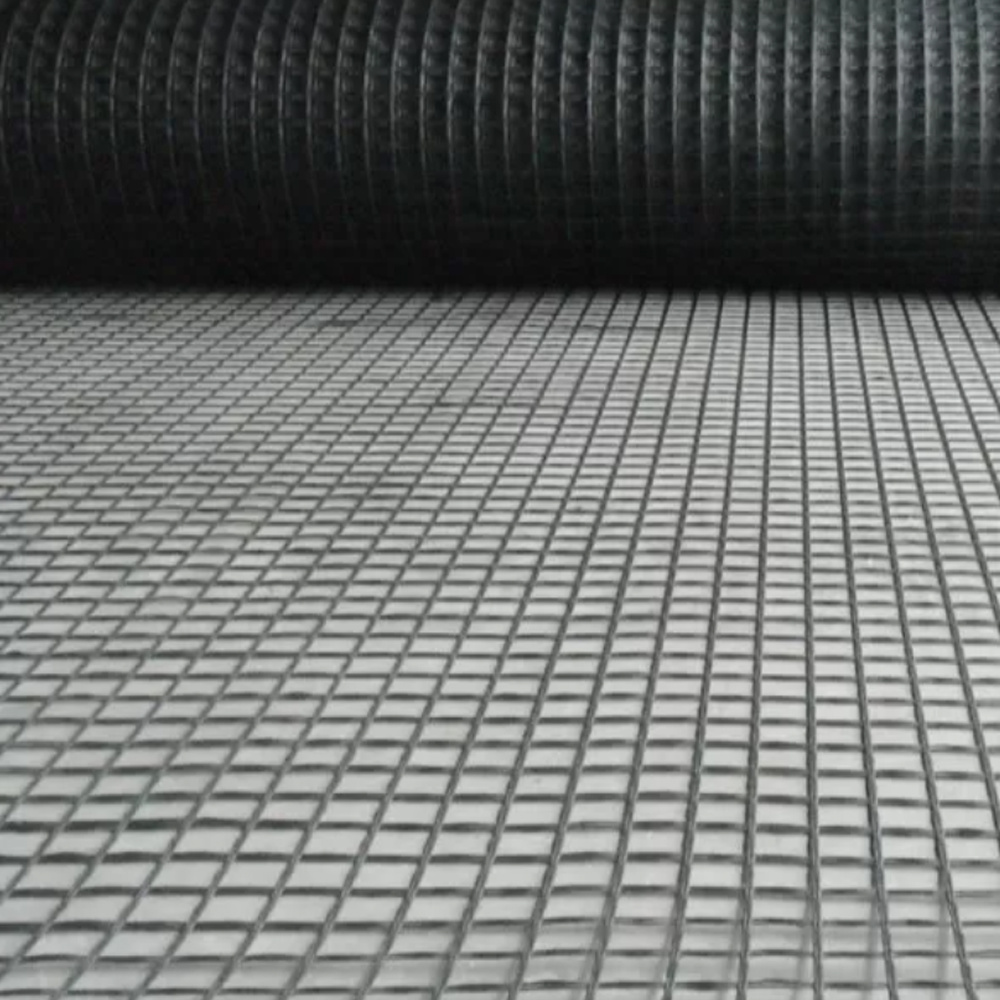 Polipropileno biaxial PP Geomalla plástica para la protección suave de la pendiente del muro de contención de la base del camino del suelo