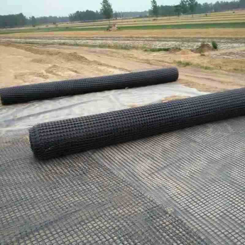 Fiberglass Geogrid 140kN Spot Reinforced Bidirectional Geogrid High Temperature Pavement